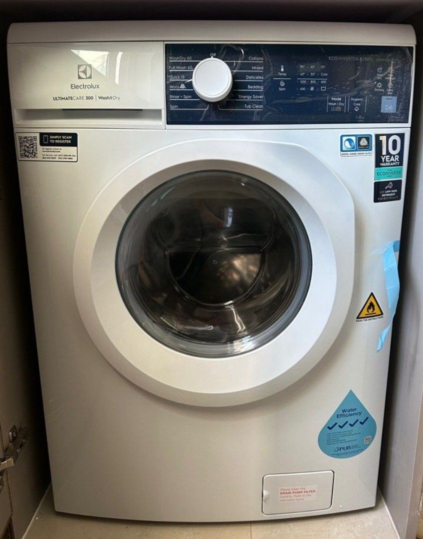 Brand New Electrolux care 300 wash and dry machine, TV & Home