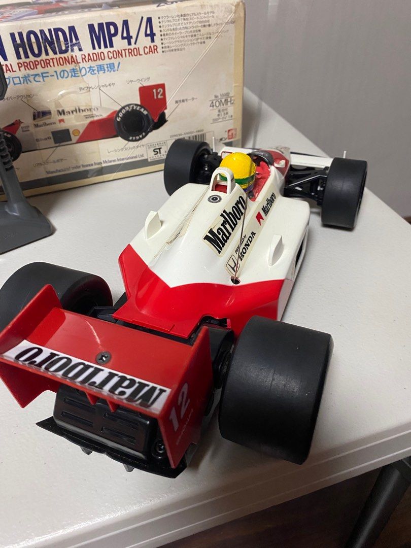 Formula 1 Mclaren Vintage RC (Category: Vehicle & Diecast Models) located in Manila. Submitted by toysandtreasures (Listing ID 1266755789, Image 3). Description: FOR SALE!!! McLaren Mp4/4 *Formula 1 Vintage Mclaren Senna *Complete with box *Working just needs battery *in good condition *Big scale 1:13.