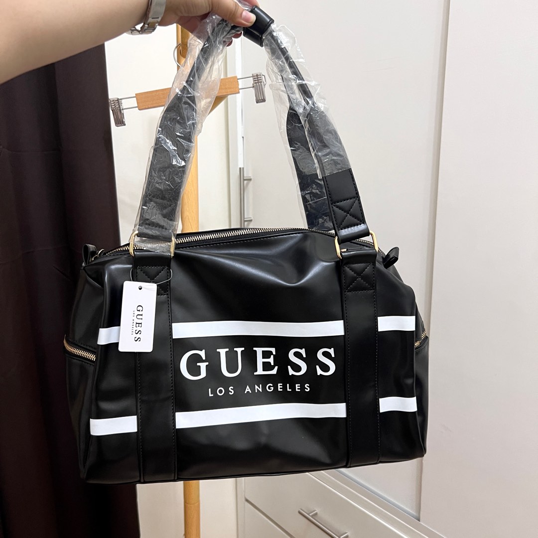 GUESS Leather Travel Bag with Strap Women s Fashion Bags