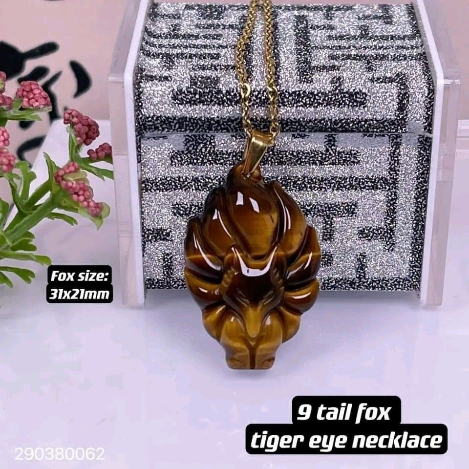 Nine tailed fox tiger eye necklace (Category: Necklaces) located in Manila. Submitted by luckycharmsonlineshopping_ (Listing ID 1266731880, Image 2). Description: New new new 💥💥💥 🌈9 tailed fox tigers eye stainless necklace🌈 ✅authentic tigers eye, stainless necklace chain , pendant holder : stainless gold ✅size: 👉fox: 21x31mm, 👉necklace chain:18inches (can request size 18-24inches) 💎 Tiger-eye: Stone of discipline,wealth, protection 💎 9-t