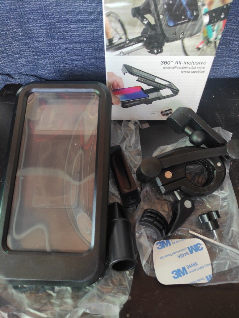 Phone holder (Category: Mounts & Holders) located in Trece Martires City. Submitted by chipmaster74 (Listing ID 1266703506, Image 2). Description: complete set of phone holder for bike or motorcycle. waterproof case. can hold large phone. never nagamit since nun nabili..