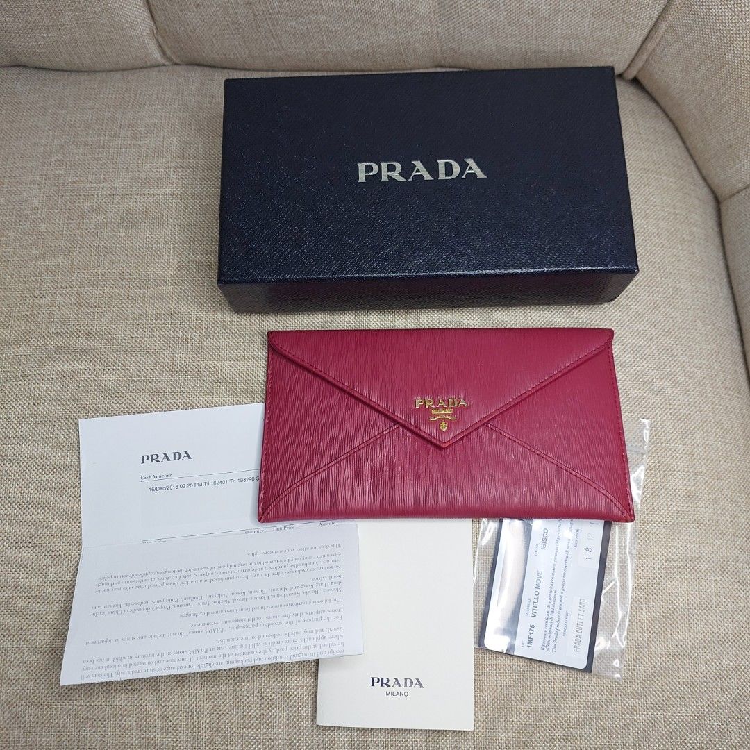PRADA Vitello Move Envelope Wallet Ibisco RUSH SALE (Category: Luxury Bags & Wallets) located in Imus. Submitted by impulsiveshopperjen (Listing ID 1266725446, Image 1). Description: 🚩 bought in Prada Sano Outlet Japan | originally bought for Php , ⚠️ still in good condition but with minor scuffs on edges and inside stain( see pics for your reference) ♻ RFS: decluttering 📍 Inclusions: Box, card and receipt 📏 ☞ 📸 NOTE: Color may vary in actual
