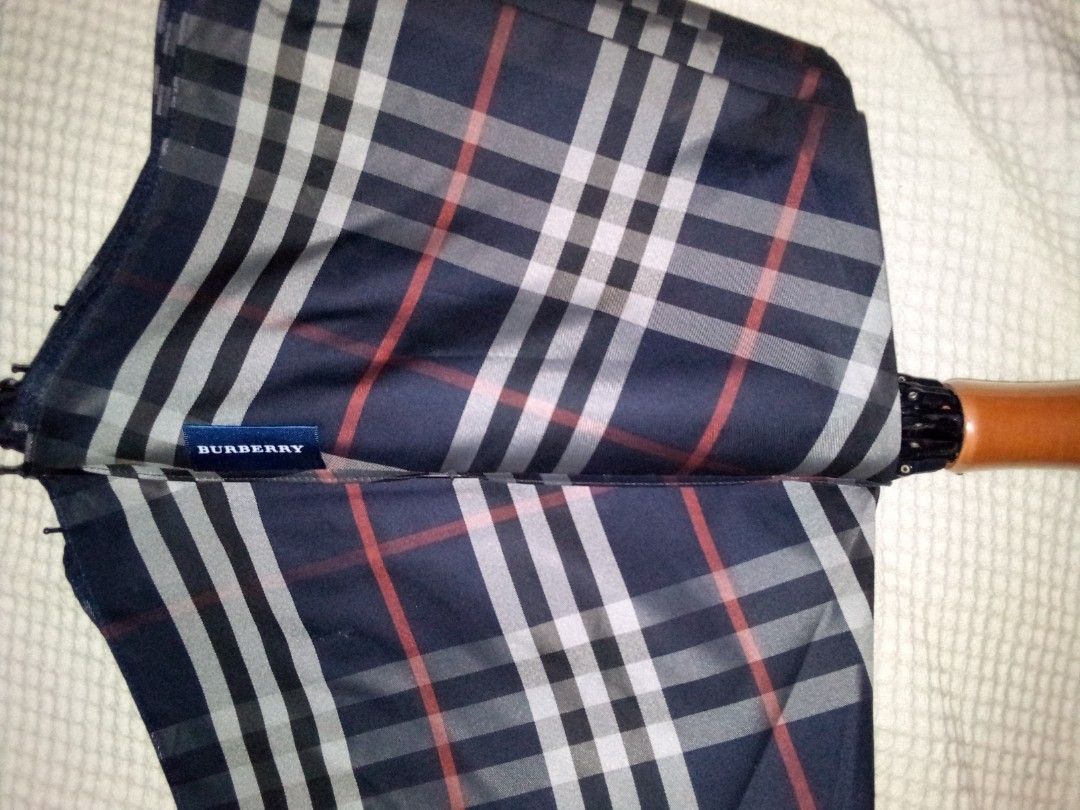 Burberry Umbrella (Category: Umbrellas) located in Calapan. Submitted by estheronl (Listing ID 1266991669, Image 1). Description: Burberry Umbrella Very good condition Flaw: 2nd photo Rust sa snap ng cover and metal na triangle-pwedeng i-remove No major flaws sa mismong umbrella Mop: Gcash, Paymaya, Bpi Shipping couriers: J&t, LBC Shipping sched: Wed, Sat..