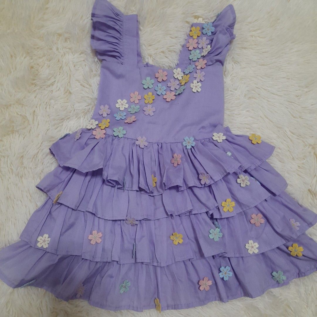 CUSTOM ISABELLA DRESS 5T (Category: Babies & Kids Fashion) located in Rizal. Submitted by decluttertayoph (Listing ID 1266935164, Image 1). Description: custom made, flowers are hand sewn very nice when worn, I can send photo worn twice, on photoshoot & birthday only adjustable back.