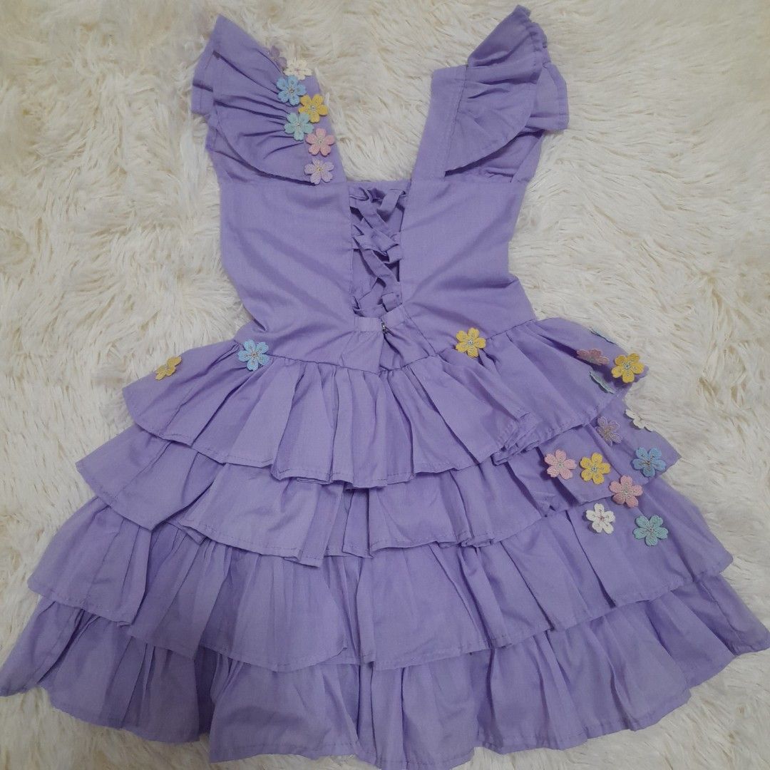 CUSTOM ISABELLA DRESS 5T (Category: Babies & Kids Fashion) located in Rizal. Submitted by decluttertayoph (Listing ID 1266935164, Image 2). Description: custom made, flowers are hand sewn very nice when worn, I can send photo worn twice, on photoshoot & birthday only adjustable back.