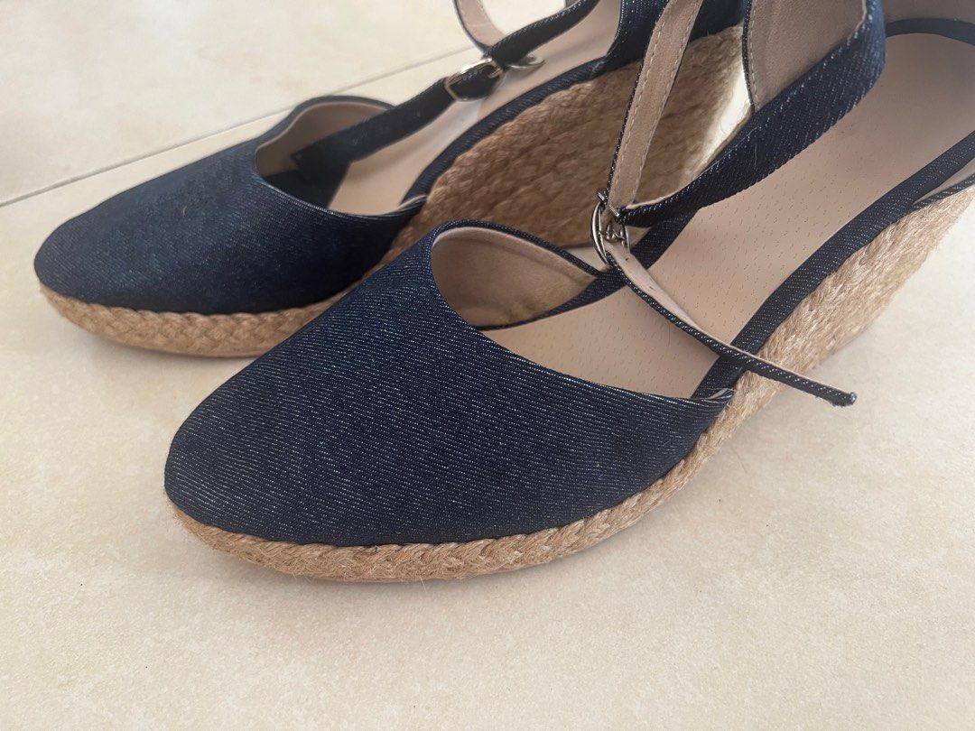 Denim wedge shoes (Category: Wedges) located in Paranaque City. Submitted by cvcrossing (Listing ID 1266851111, Image 1). Description: Size 10/11 3.5 inch wedge Navy blue denim upper material.