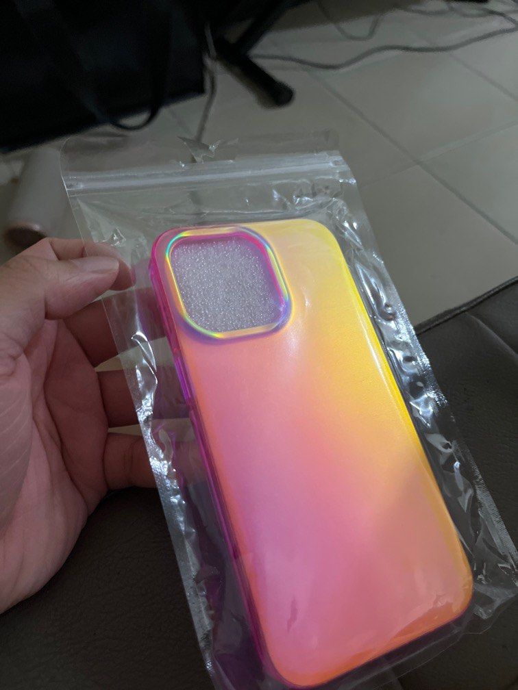 Holographic Iridiscent Pink Iphone 13 Pro Phone Case (Category: Other Accessories) located in Makati City. Submitted by makistuff (Listing ID 1266974766, Image 2). Description: Gorgeous iridiscent/duochrome phone case for iphone 13 pro Rfs: bought the wrong size for my iphone 13.