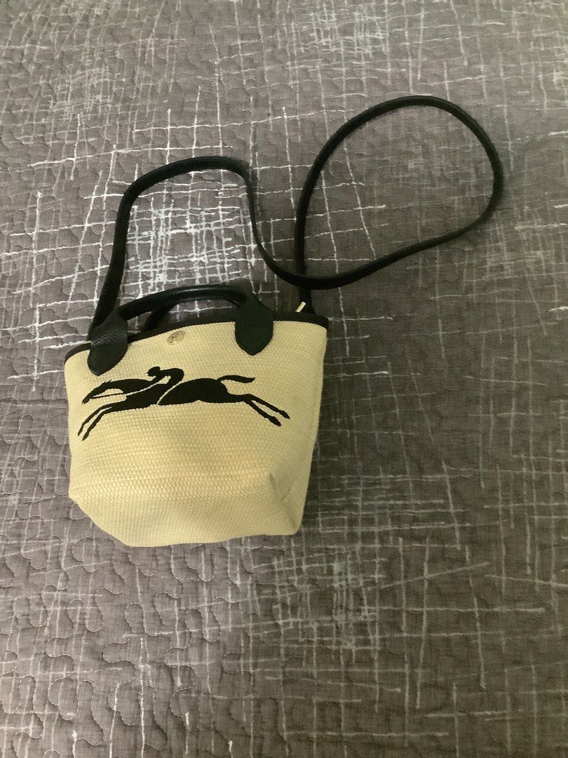 Long Champ (Category: Luxury Bags & Wallets) located in Dagupan City. Submitted by strapsandstripes (Listing ID 1266972309, Image 2). Description: Le Pliage Paris-Saint-Tropez Bucket Bag Black Canvas.