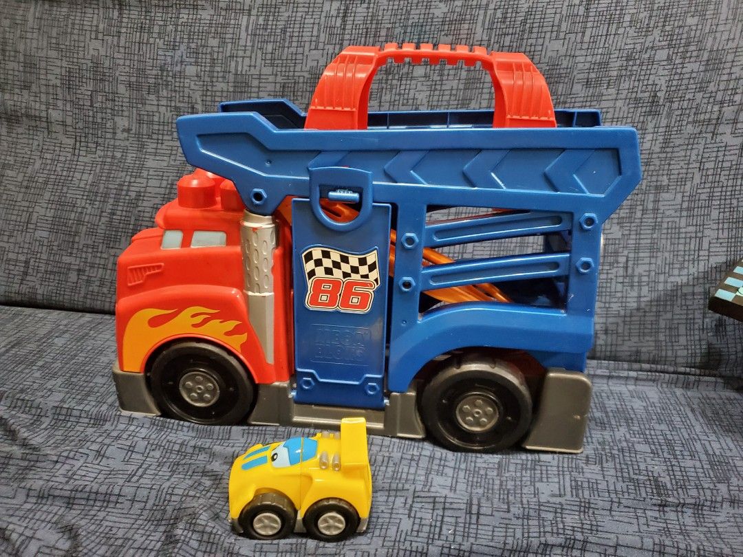 Megablocks truck with car (Category: Lego & Building Sets) located in Taytay. Submitted by xismart (Listing ID 1266870684, Image 1). Description: Megablock truck with car. truck can transform into a track. selling low. loved by my son pero he outgrew it na. still in very good condition. missing 2 pieces of blocks but will not affect the function of the truck and car. just a bit dusty. will clean it when you buy it. bought it from Canada. 1st user