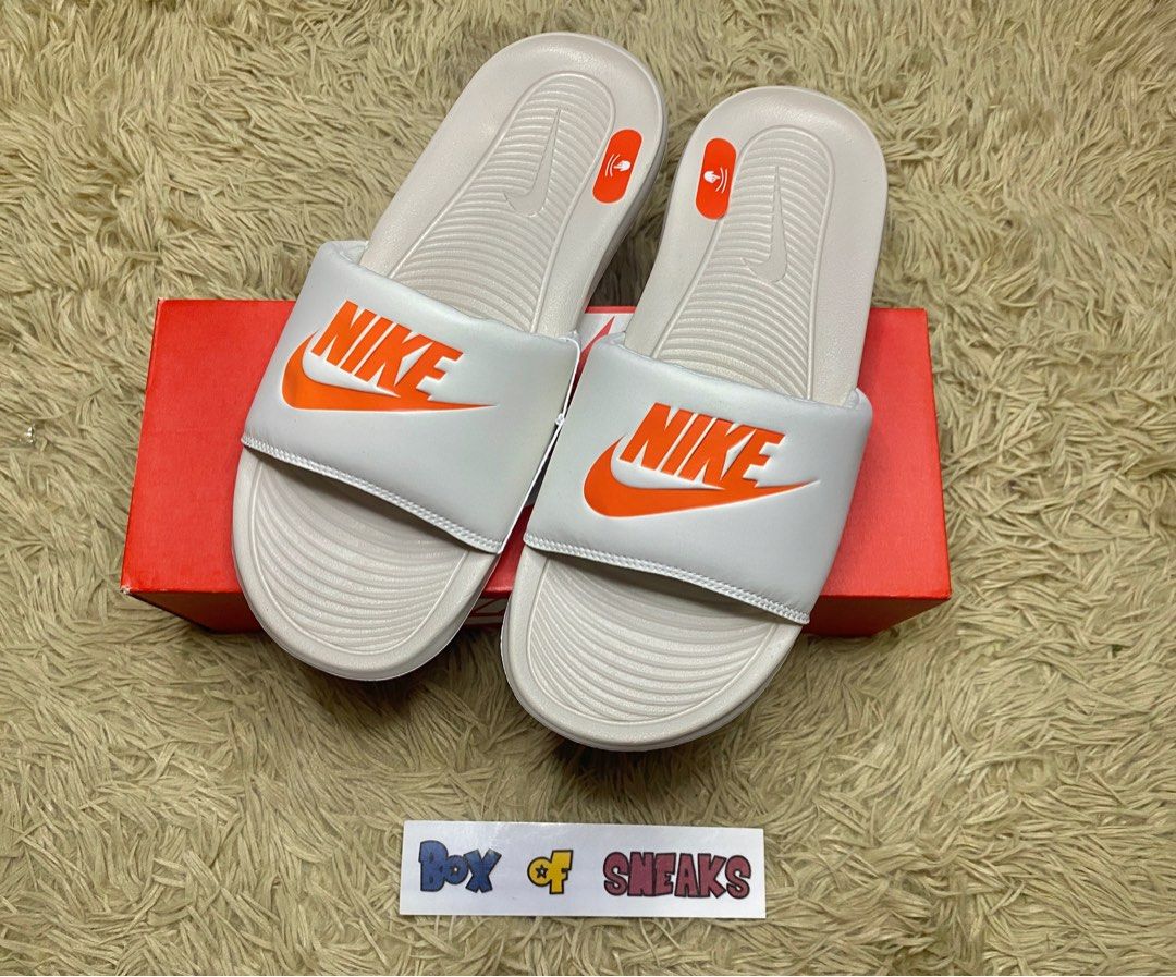 White and orange nike slides discount