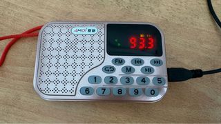 Portable FM Radio recharge with cable