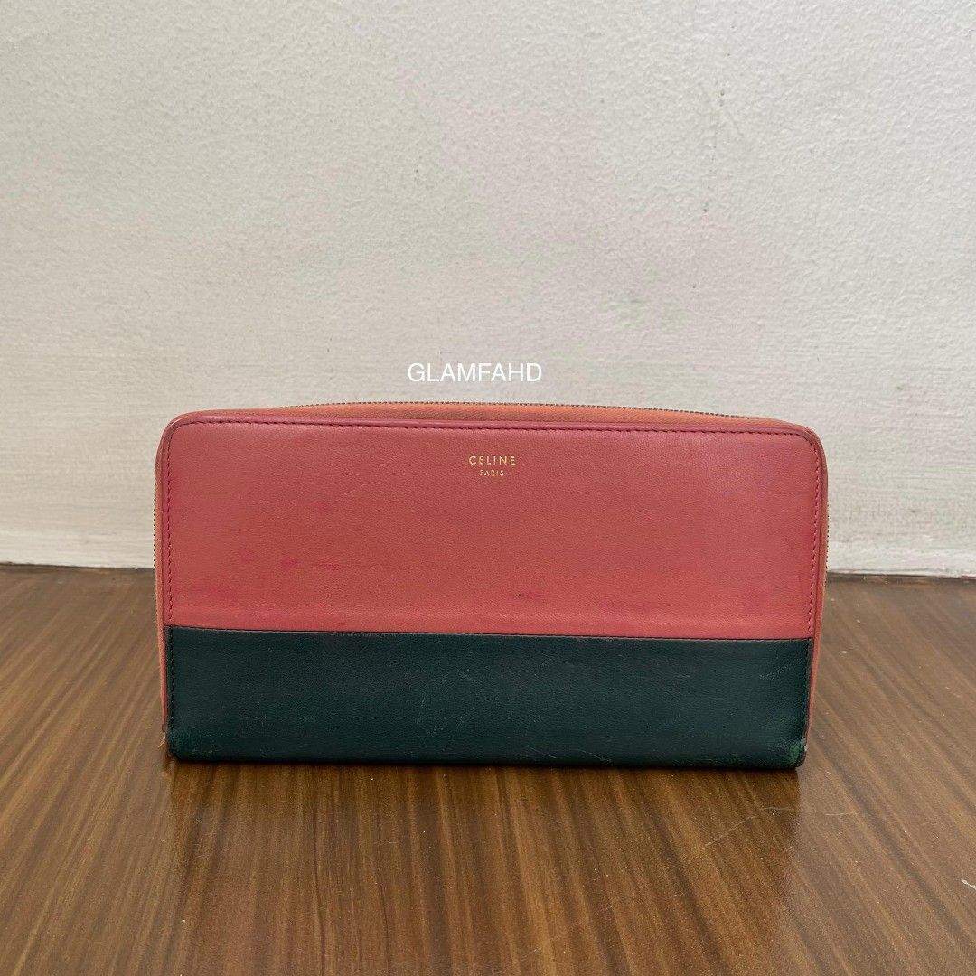 Pre Owned Authentic CELINE PARIS Leather Long Wallet (Category: Luxury Bags & Wallets) located in Paranaque City. Submitted by Glamfahd (Listing ID 1266953283, Image 1). Description: PRE OWNED AUTHENTIC CELINE PARIS LONG WALLET Features Measurement: 7.5x4 inches Leather Color Multicolor 12 card slots 2 compartments for bills and receipts 2 slip compartments Coin compartment on middle with zipper closure Inclusion/s: None Condition Good condition 