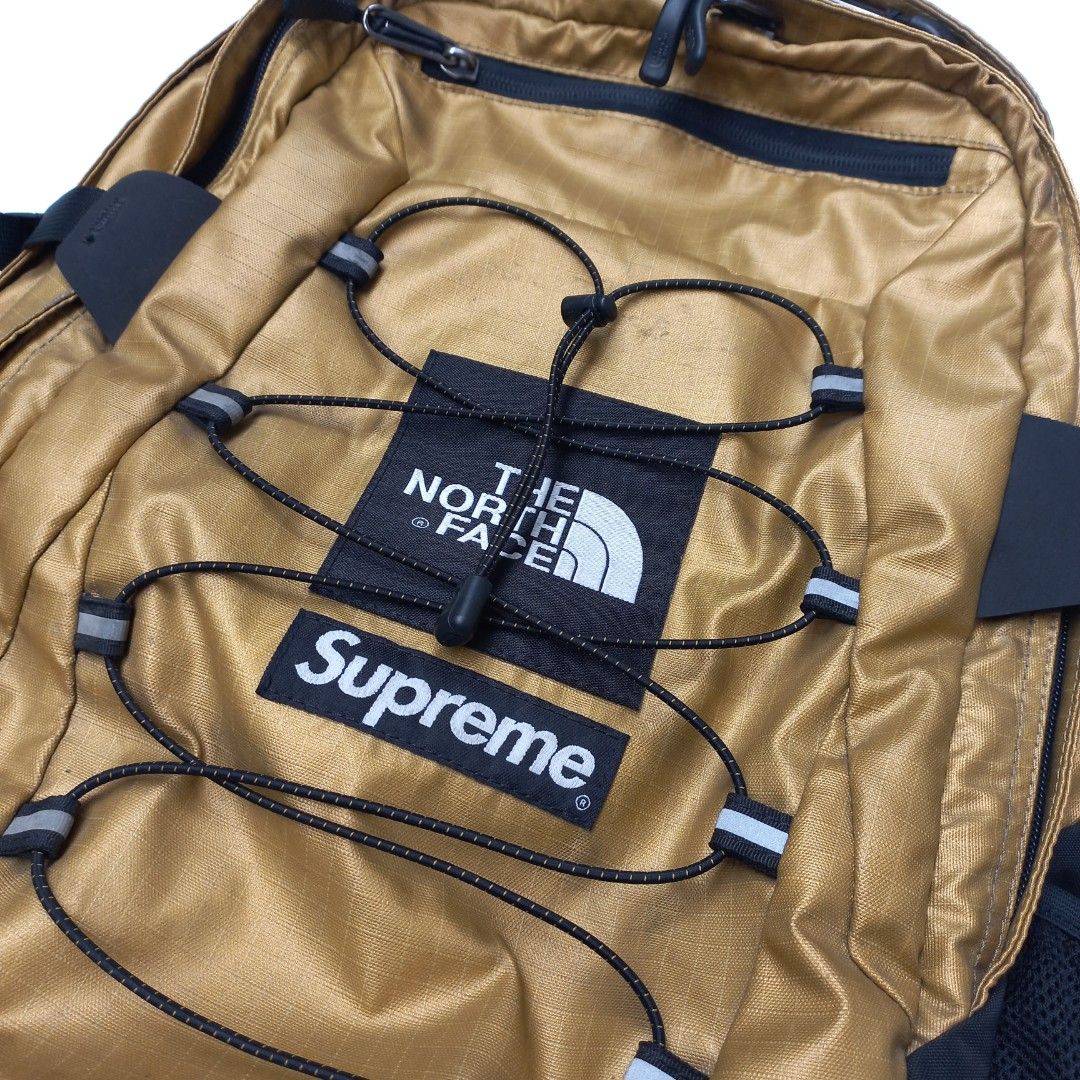 Supreme the north face outlet metallic borealis backpack gold