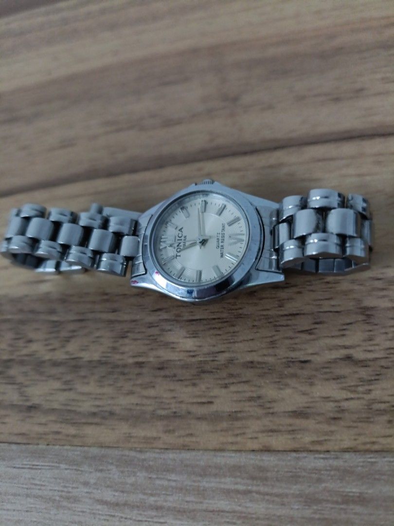 Tonica watch (Category: Watches) located in Singapore. Submitted by lillyong0751 (Listing ID 1266878274, Image 1). Description: This is a dress watch. there are some physical scratches on the watch. made in Japan.