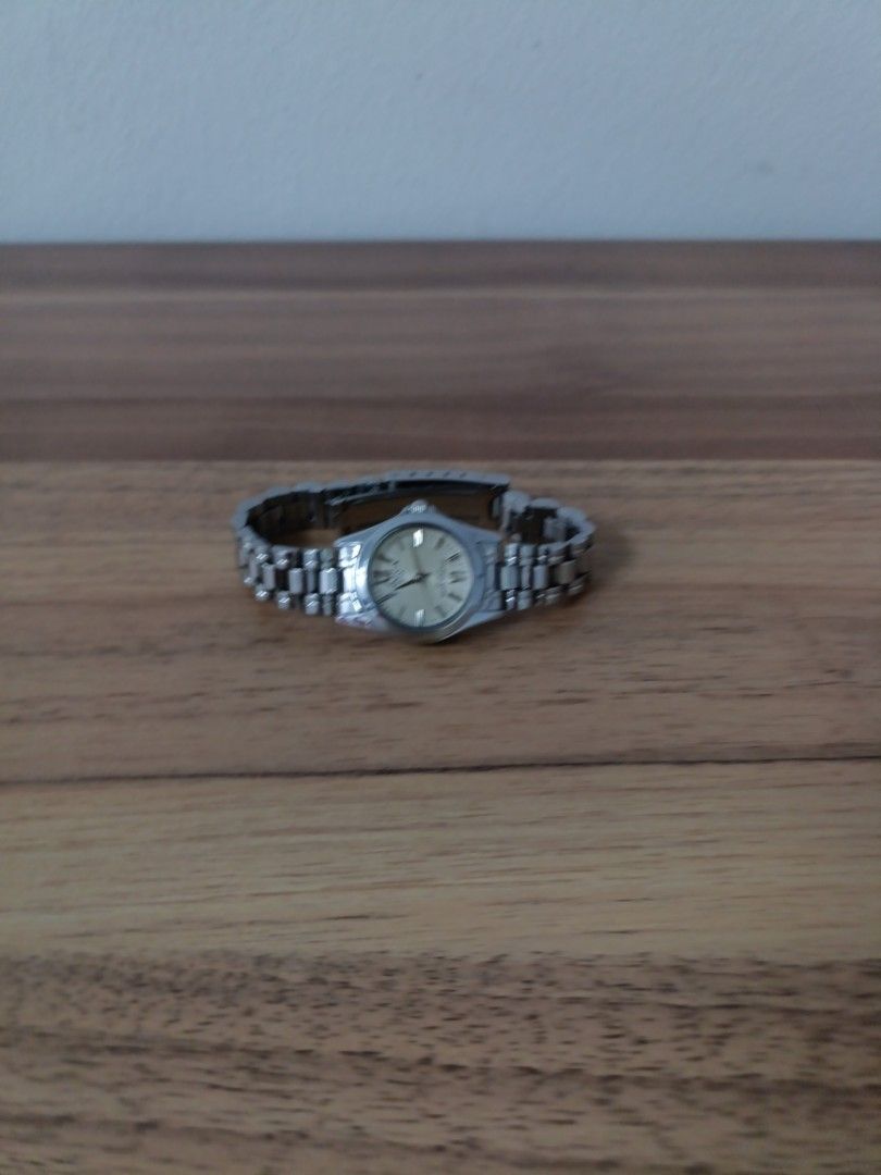 Tonica watch (Category: Watches) located in Singapore. Submitted by lillyong0751 (Listing ID 1266878274, Image 3). Description: This is a dress watch. there are some physical scratches on the watch. made in Japan.