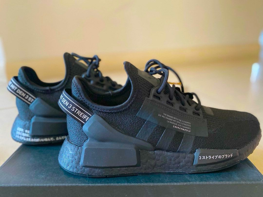 Black adidas with iridescent hot sale stripes