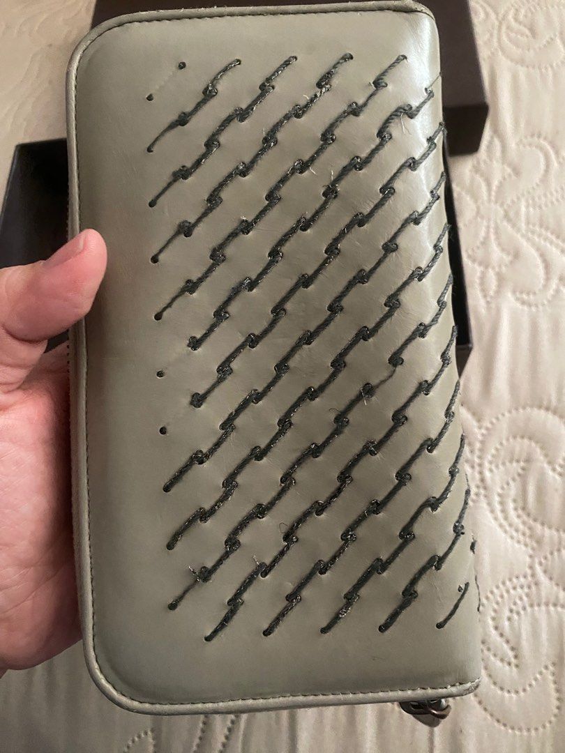 bottega venetta wallet (Category: Luxury Bags & Wallets) located in Antipolo. Submitted by prelovedcloseta (Listing ID 1267058857, Image 3). Description: auth bottega wallet long wallet light gray color preloved- with minor rubs check pics for reference missing stitch ( can be done in restoration) with box and dustbag.