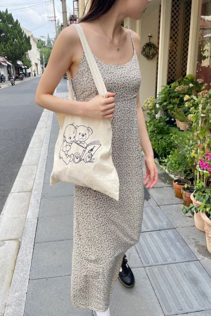 Brandy Melville cream and navy floral Colleen slip maxi dress, Women's  Fashion, Dresses & Sets, Dresses on Carousell