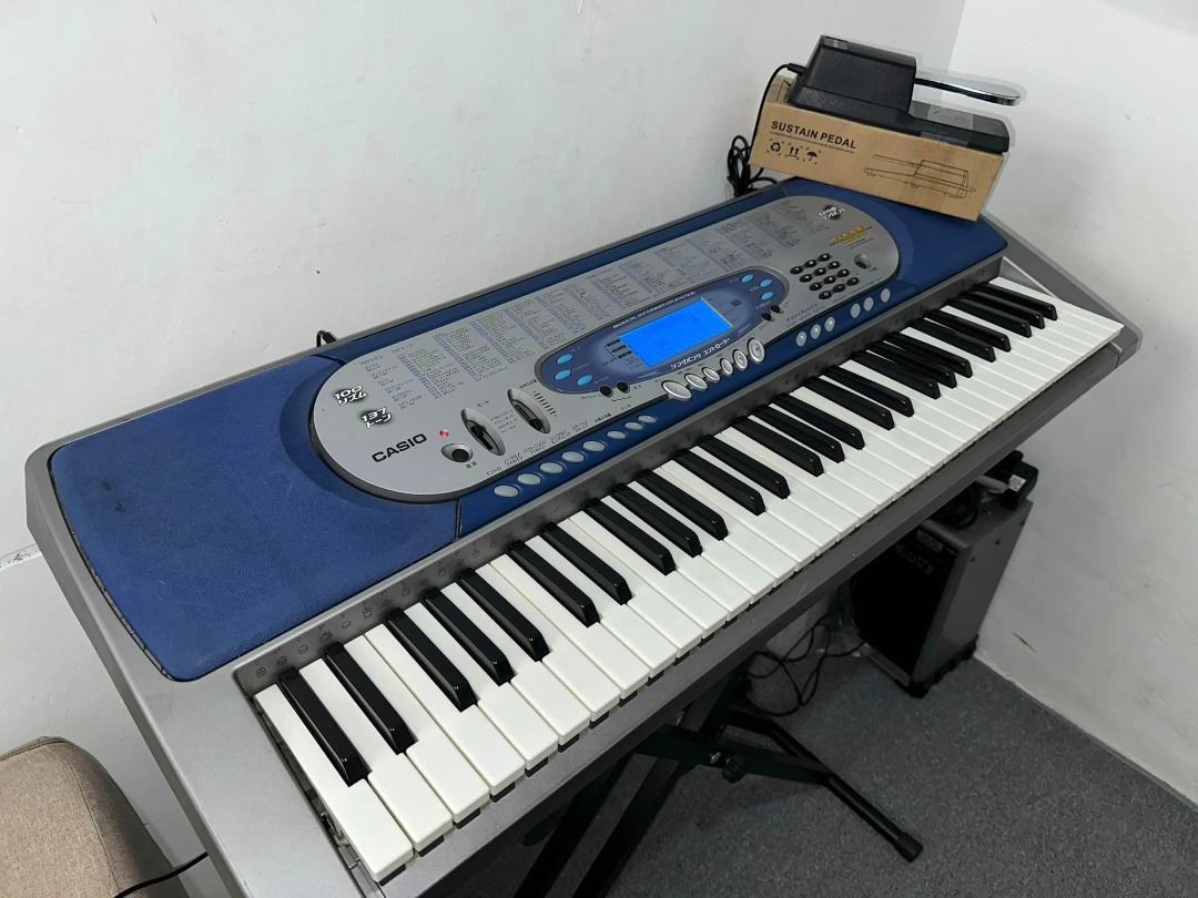 Casio LK 65 Piano Keyboard 61 Keys Touch Response with Sustain Pedal Included