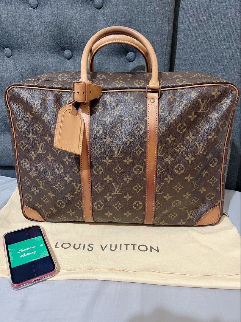 Louis Vuitton - Portobello Shoulder bag - Catawiki
