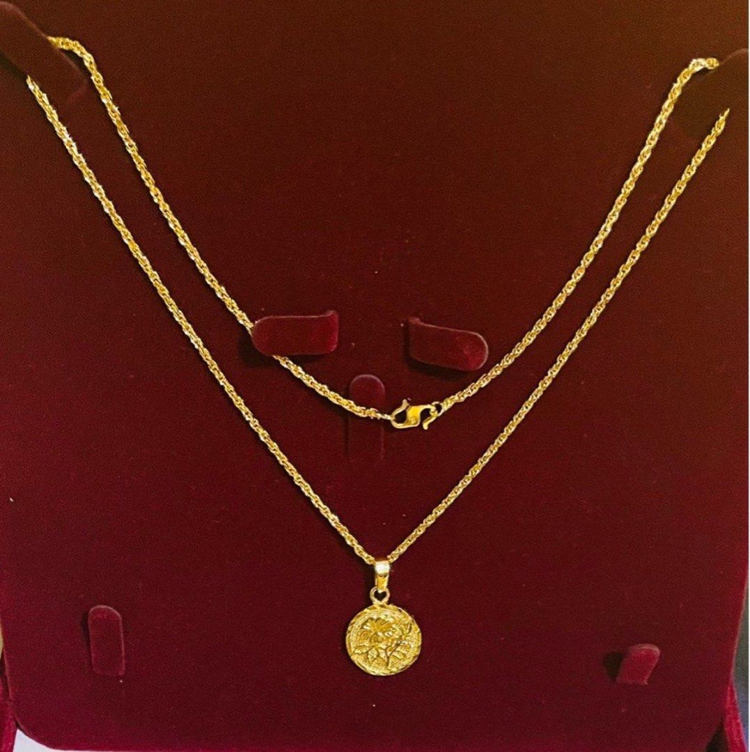 Gold hotsell hibiscus necklace