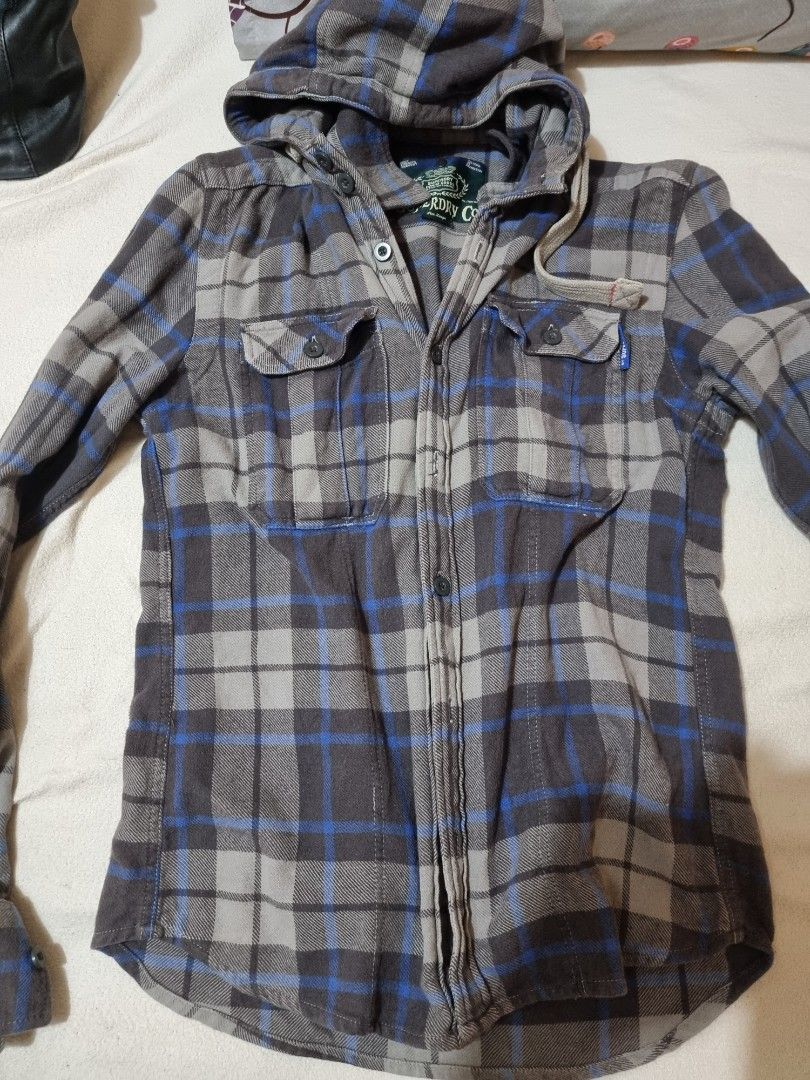 Superdry Plaid Checkered Polo Jacket (Category: Coats, Jackets and Outerwear) located in Bacolod City. Submitted by lux-influx (Listing ID 1267089446, Image 1). Description: Superdry plaid or checkered jacket, like a thick polo jacket, with hood, L on tag but measures 20" x 28". Free shipping. Please check other posts. Thanks..