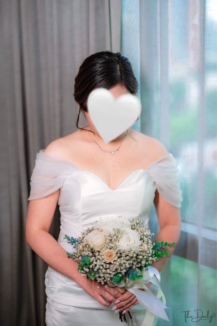 Wedding gown (Category: Evening dresses & gowns) located in Marilao. Submitted by em_prelovedx (Listing ID 1267096513, Image 2). Description: Selling my wedding gown Used last November 5, 2023 -Free veil -Slippers -Small bridal bag -Free Bridal Robe -Free shoes -Height: 4’11 -Waist: 27-29 -Bust: 32-34 .