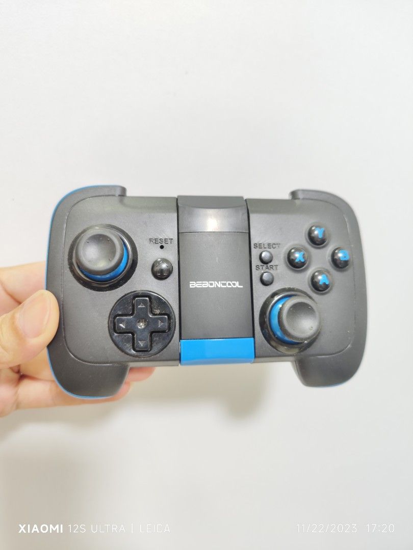 Wireless controller (Category: Controllers) located in Singapore. Submitted by silencekillers (Listing ID 1267096659, Image 1). Description: Personal item Bought $29.90 Seldom use Just the controller for mobile phone use play game Interested buyer text me Thx.
