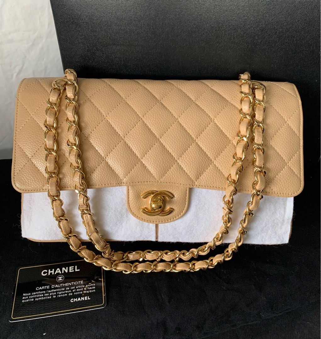 Authentic Chanel Beige CC Medallion Charm Chevron Flap Bag, Luxury, Bags &  Wallets on Carousell