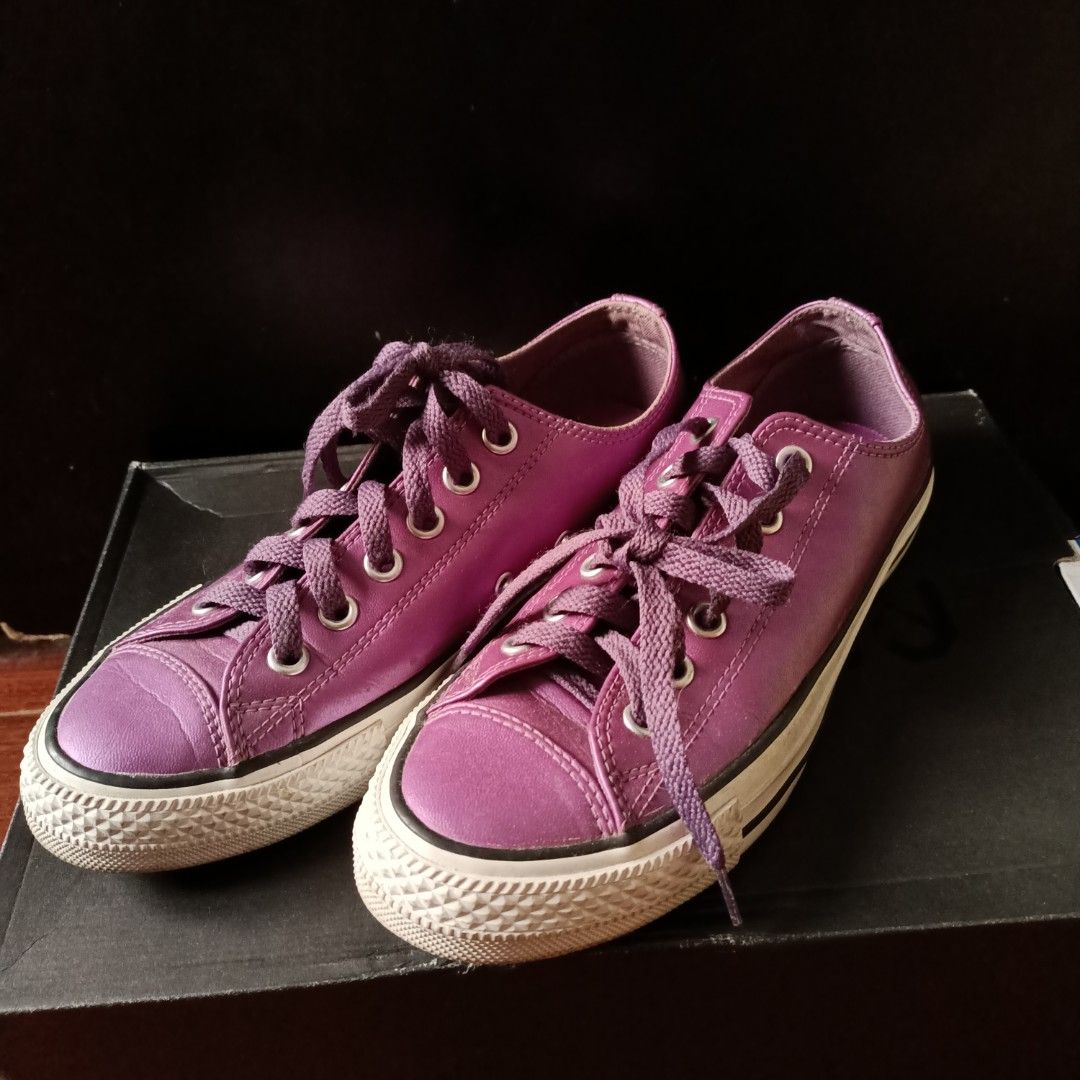 Converse All Star Women Sneakers (Category: Sneakers) located in Taguig. Submitted by atticusmerch (Listing ID 1267285344, Image 2). Description: Violet (Plum) purple soft leather upper. Silver glitter mesh tongue. Excellent condition. Barely worn. Great tread. Super clean inside and out. Size 8US Women MOP: Gcash/Bank Transfer.