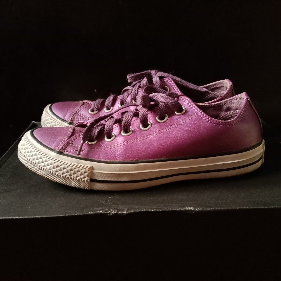 Converse All Star Women Sneakers (Category: Sneakers) located in Taguig. Submitted by atticusmerch (Listing ID 1267285344, Image 3). Description: Violet (Plum) purple soft leather upper. Silver glitter mesh tongue. Excellent condition. Barely worn. Great tread. Super clean inside and out. Size 8US Women MOP: Gcash/Bank Transfer.