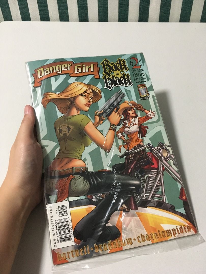 Danger Girl: Back in Black #2 (single comic issue) (Category: Comics & Manga) located in Binangonan. Submitted by quinns_garage_sale (Listing ID 1267212667, Image 1). Description: Danger Girl: Back in Black #2 is an issue of the series Danger Girl: Back in Black (Volume 1) with a cover date of February, 2006. It was published on December 14, 2005. "Fire up your chopper and join Danger Girls Abbey Chase and Sydney Savage as they continue their que