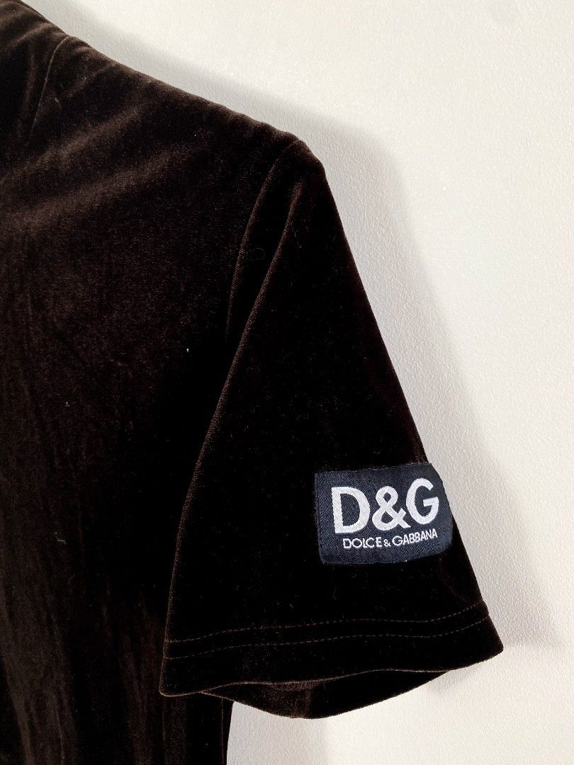 Dolce & Gabbana Suede Mock Neck Top (Category: Luxury Apparel) located in Castillejos. Submitted by lalainecloset22 (Listing ID 1267285913, Image 3). Description: Vintage Dolce & Gabbana Mock Neck Blouse Made in Italy excellent condition width 17 length 21.