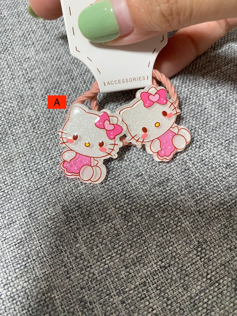 Hello Kitty hair ties, Babies & Kids, Babies & Kids Fashion on Carousell