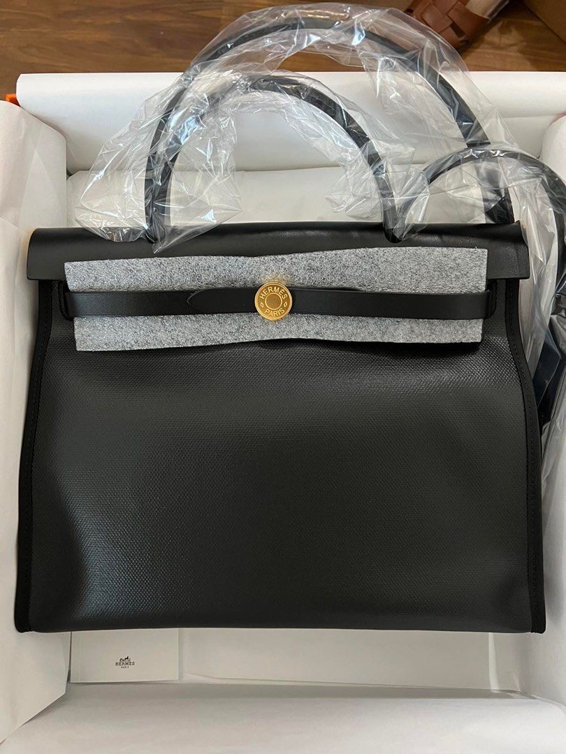 Hermes Herbag 2023 (Category: Luxury Bags & Wallets) located in Makati City. Submitted by myterry1941 (Listing ID 1267248256, Image 1). Description: Brand new comes complete with box and paper bag Herbag 31 in black coated canvass Gold hardware As seen in photos Direct store purchase .