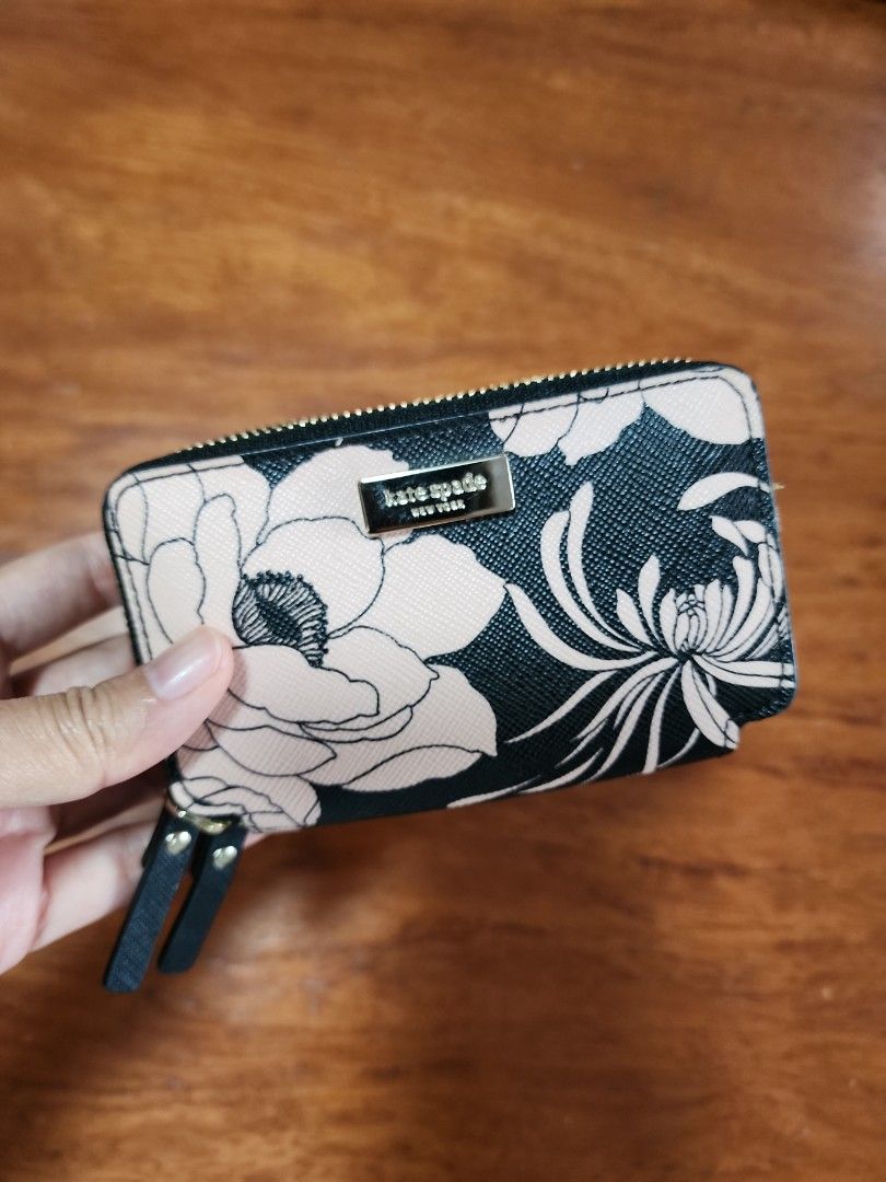 Kate Spade Mini Zip Around Wallet (Category: Luxury Bags & Wallets) located in Quezon City. Submitted by ShopPDplusK (Listing ID 1267229815, Image 1). Description: authentic. RFS- impulse buy, decluttering. SRP 5950 PhP.