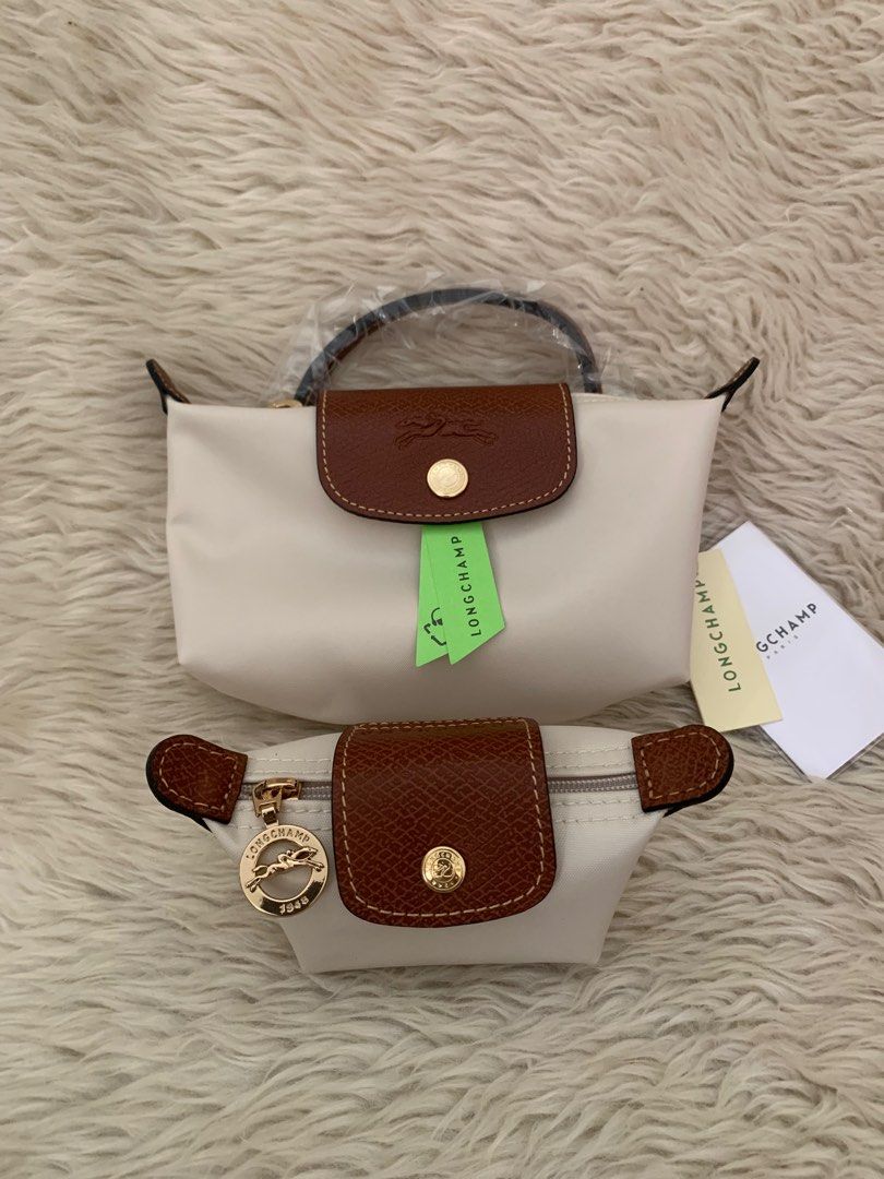 Longchamp mini and coinspurse authentic (Category: Luxury Bags & Wallets) located in Cabuyao City. Submitted by luxbymishy (Listing ID 1267349888, Image 1). Description: Bundle Brand new complete inclusions .