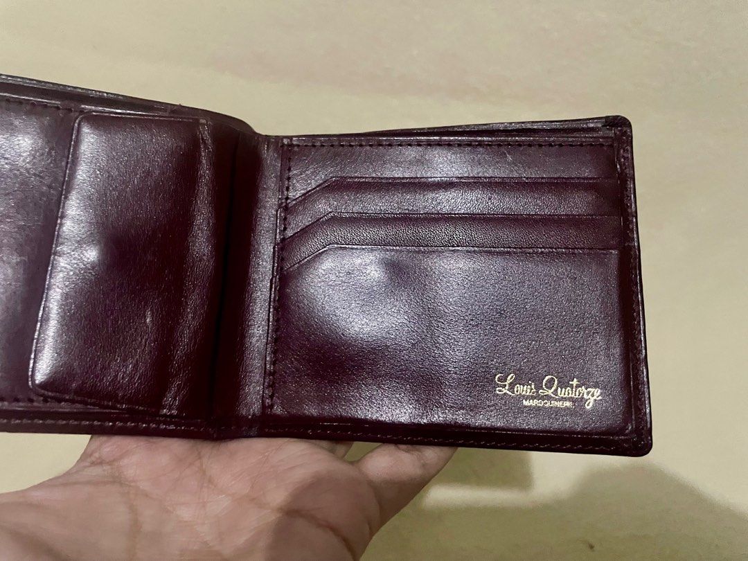 Louis quatorz Maroon bifold wallet (Category: Luxury Bags & Wallets) located in San Pablo. Submitted by prelovedbymistyblue (Listing ID 1267285838, Image 3). Description: Super nice LQ wallet. No major flaws except for some scatches on the leather and minimal flaw on the stitch on the coin compartment. With 3 card compartment and also 2 bills compartment. Selling low for 750. .