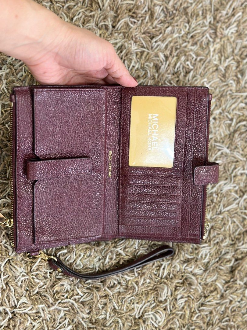 Maroon Michael Kors wallet wristlet
