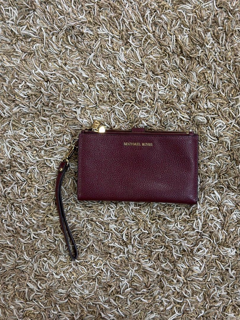 Maroon Michael Kors wallet wristlet