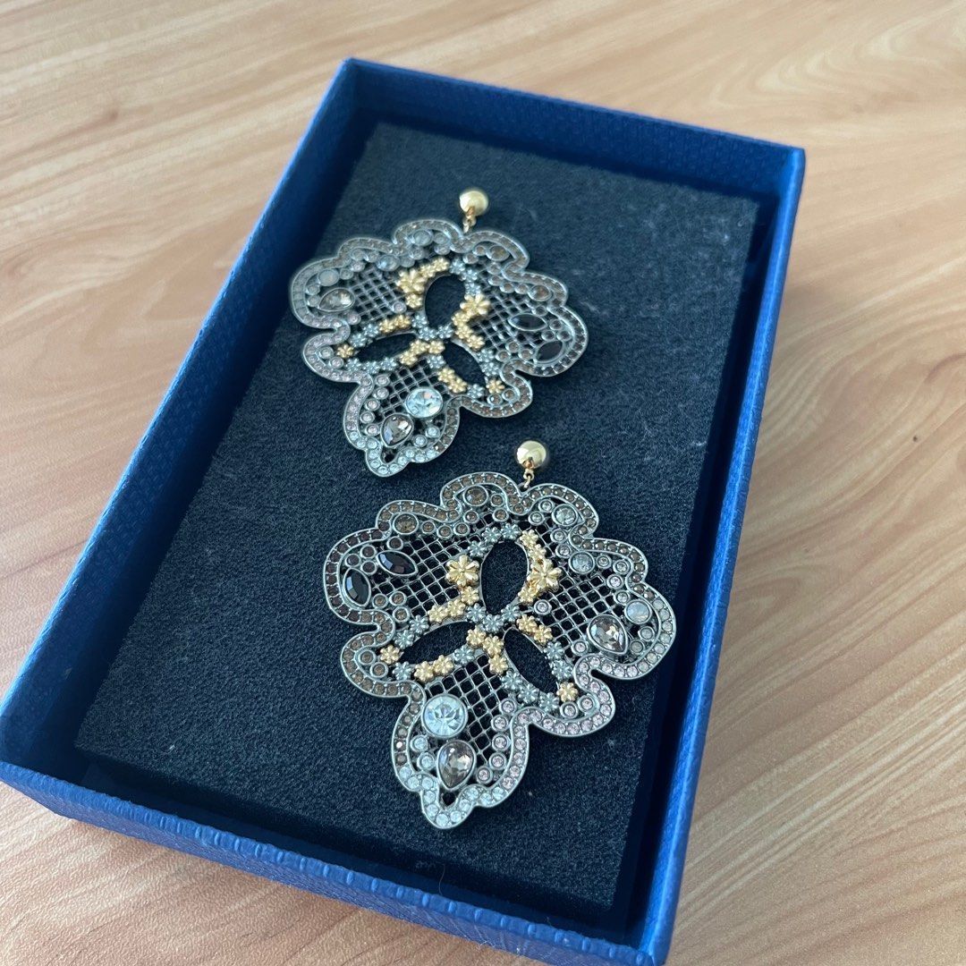 Swarovski earrings cost best sale