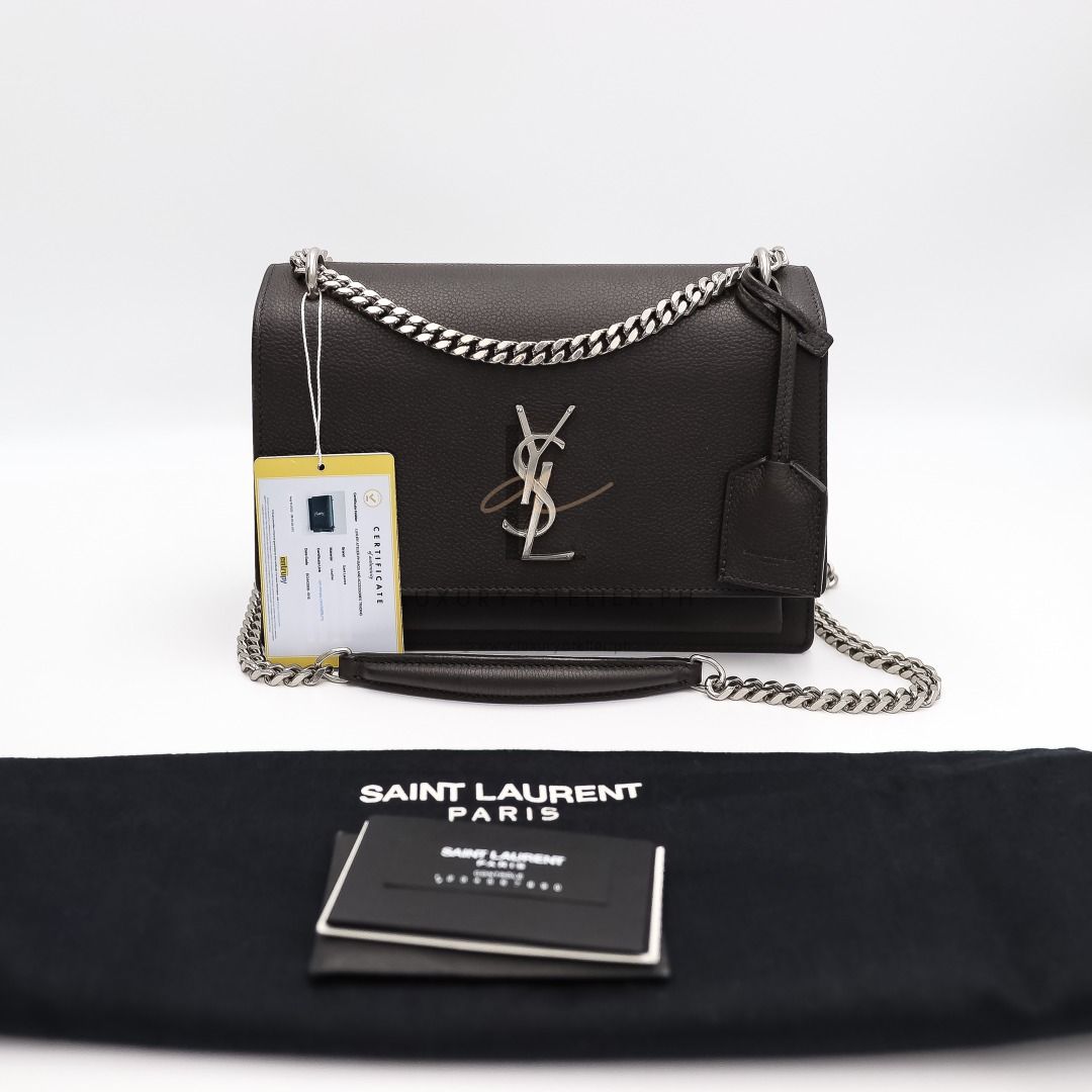 YSL Sunset Medium Dark Gray (Category: Luxury Bags & Wallets) located in Paranaque City. Submitted by luxuryatelier.ph (Listing ID 1267266255, Image 2). Description: Model: Sunset Medium Dark Gray; Date Code: BCI442906-1016 Rating: 9.5-10/10 Like New (Unused) Material: Leather; Color: Gray; Hardware: SHW Size: 22*15.5*17; strap: 28/50 cm Inclusions: Dustbag, cards, booklet COA: Entrupy Condition: No flaws to mention; unused condition CASH / LAYAW