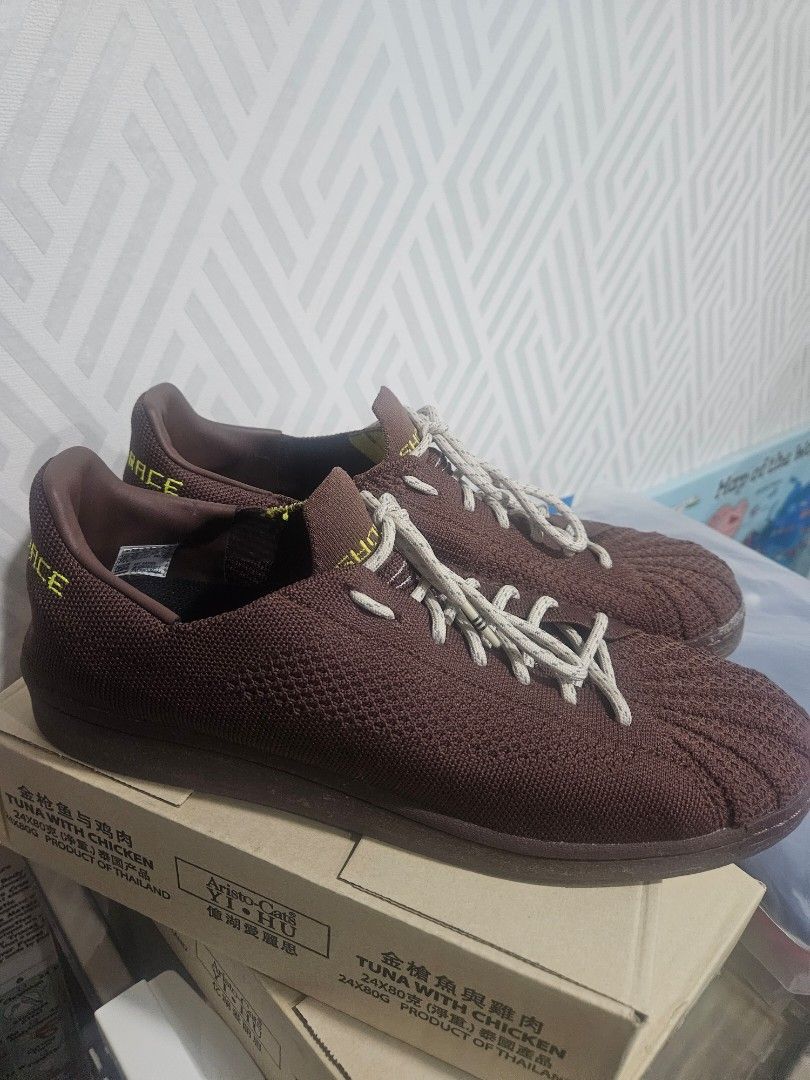 Adidas human race brown on sale