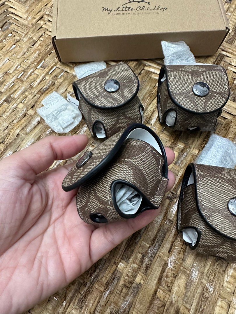 Coach earbud case bag charm outlet