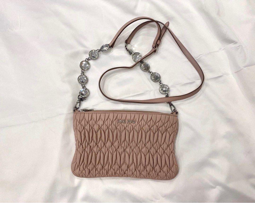 Miu miu | warm tone sling bag (Category: Luxury Bags & Wallets) located in Quezon City. Submitted by luxci.ph (Listing ID 1267403493, Image 2). Description: Miu miu | warm tone sling bag Nothing to declare No inclusion .