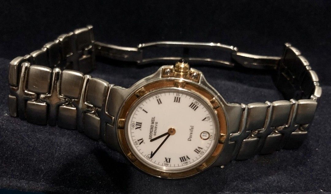 Raymond Weil Parsifal watch (Category: Men's Watches) located in Manila. Submitted by simonchkies (Listing ID 1267535973, Image 1). Description: Selling this Reymond weil Parsifal watch. Swiss watch from France. Unit only. Specs on the last picture. 8.5-9/10 smooth Slghtly negotiable. Meetups only around Bulacan or Manila area..