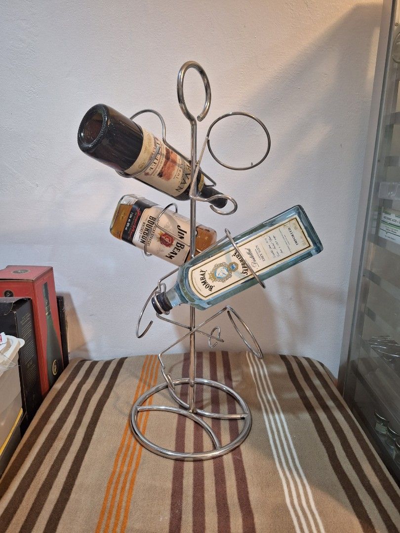 Stainless Wine rack (Category: Other Kitchenware & Tableware) located in Makati City. Submitted by mercadomyleen529 (Listing ID 1267444665, Image 1). Description: 100% stainless 6 bottles wine rack price: 1800 good condition 10/10 wine not included Jim beam for sale in separate price 600 rfs: decluttering.