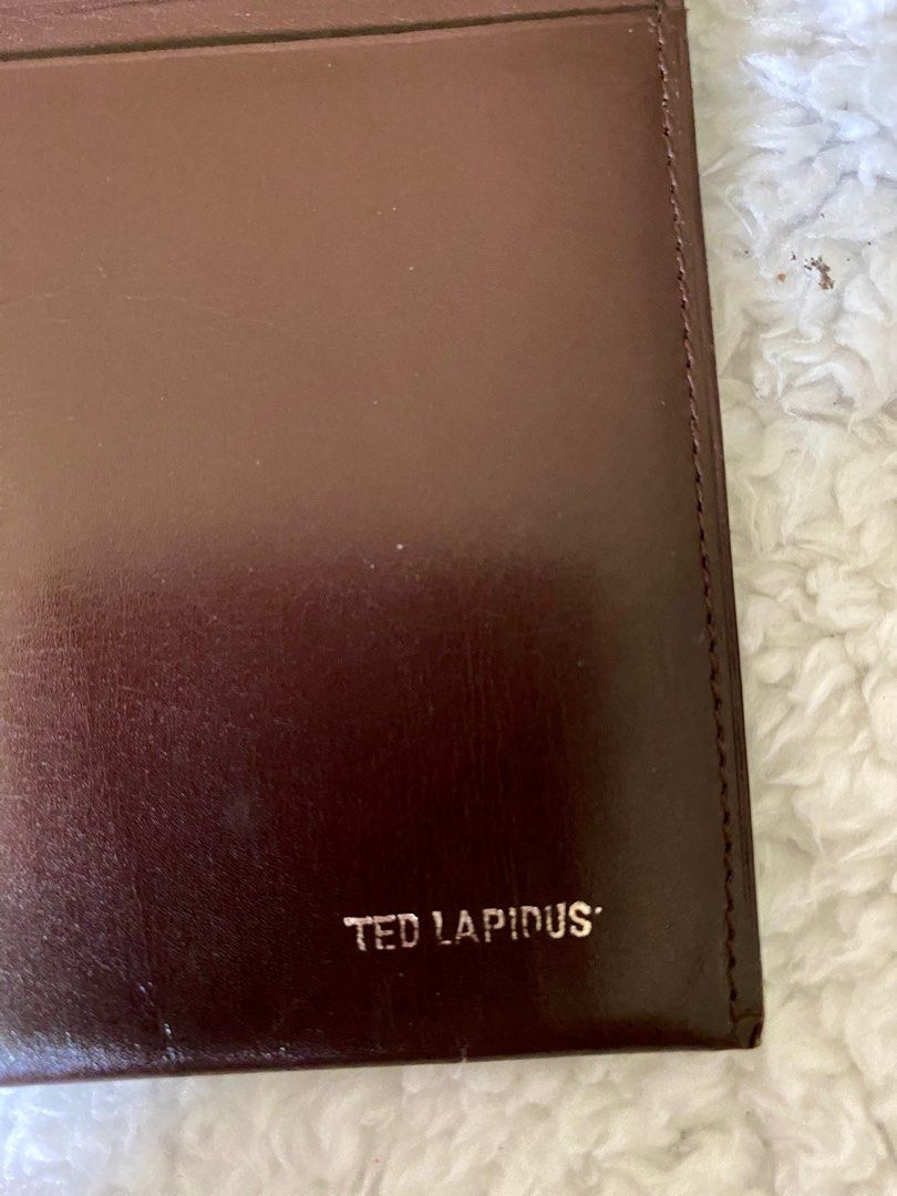 Ted Lapidus long wallet (Category: Luxury Bags & Wallets) located in Don Carlos. Submitted by pphixi (Listing ID 1267376805, Image 3). Description: Ted Lapidus soft leather wallet. Simple yet elegant. Perfect for those who does not like makakapal na wallet. Please refer to photos for details. .