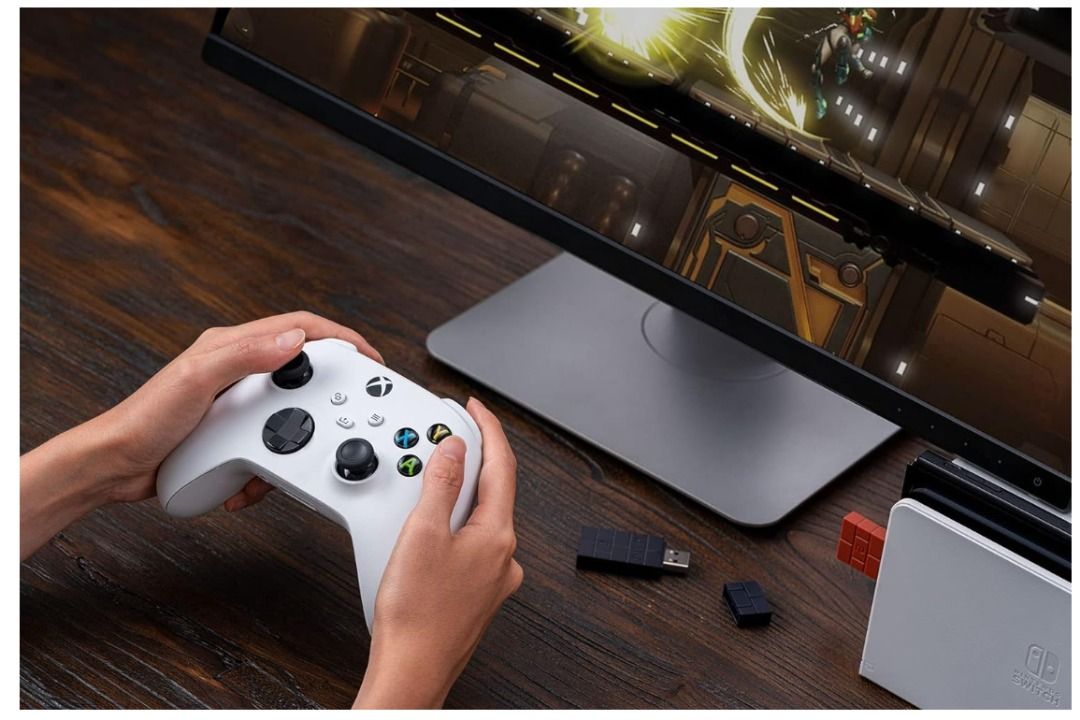 8BitDo's USB Wireless Adapter 2 Review: Easiest way to play Switch Games  with Xbox and PlayStation Controllers