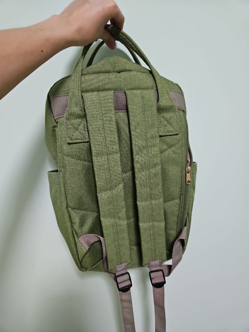 Anello Backpack green (Category: Backpacks) located in Singapore. Submitted by escaperoo (Listing ID 1267671663, Image 3). Description: Anello bag comes with multiple compartment. Carried this bag to sch and scored As thru out 🍀..